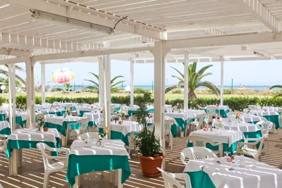 Covered pool restaurant terrace at El Mouradi Mahdia