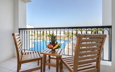 Room balcony with pool view at El Mouradi Gammarth Room balcony with pool view at El Mouradi Gammarth