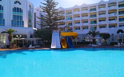 Children's water slides beside the swimming pool at El Mouradi Hammamet