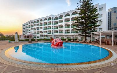 Children's pool and hotel building at El Mouradi Palace Children's pool and hotel building at El Mouradi Palace